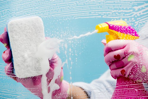 Carpet cleaning professional using protective equipment during a job