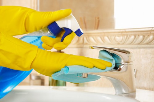 Local cleaner preparing a guest-ready short-let home in N16