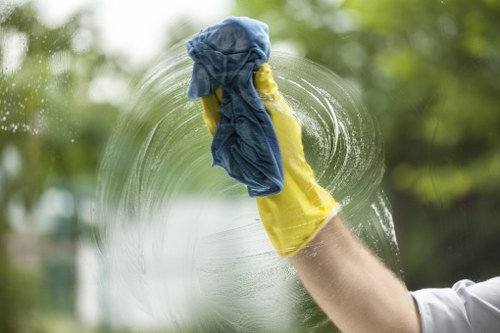 Cleaning kitchen surfaces after builders work in N16